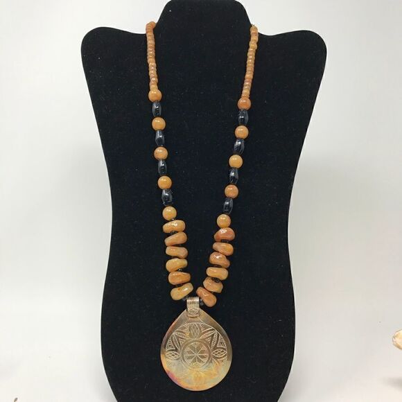 Vintage Brass pendent with butterscotch and black plastic beads necklace. - Picture 1 of 6
